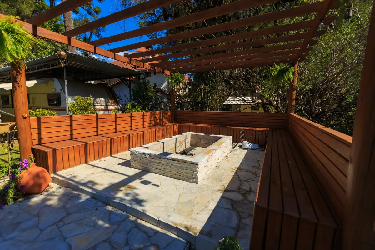 Patio with a stone fire pit