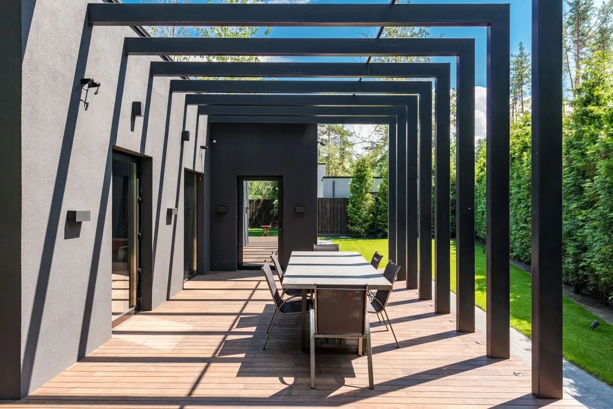 Patio with a modern pergola