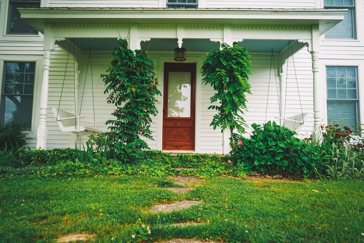 Front porch with hanging swings